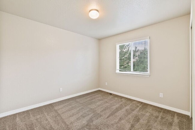 Building Photo - Spacious 3-Bedroom Home with Central A/C Near Fort Carson & Peterson