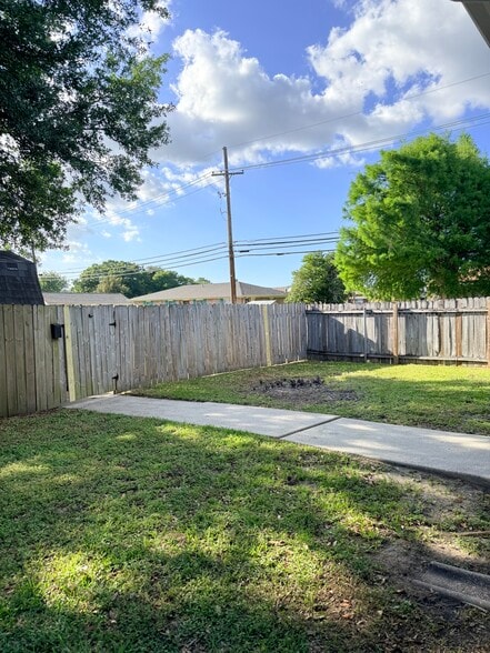 Fenced backyard - 3245 Iowa Ave