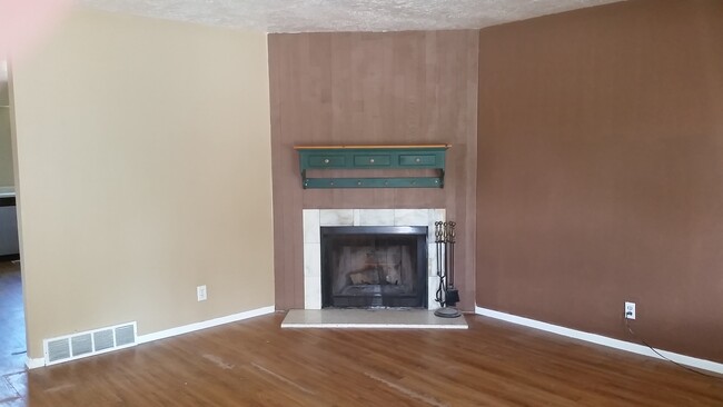 fire place in living room - 1681 E Fort Union Blvd