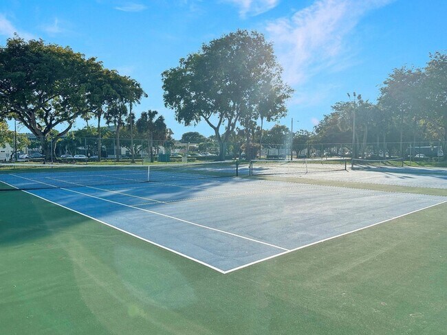 Building Photo - 6090 N Sabal Palm Blvd