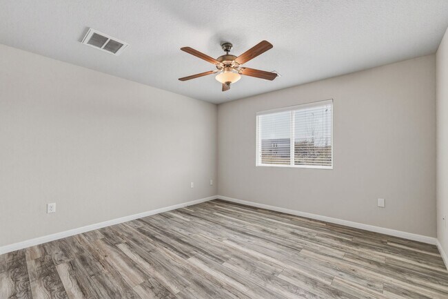 Building Photo - Gated Community Home with Solar Panels & All Appliances Included