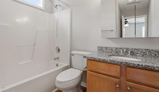 Building Photo - 1st Floor Master Bedroom