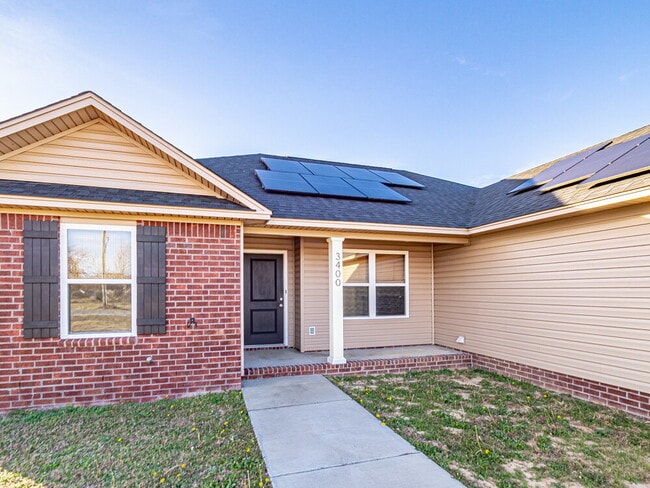 Building Photo - Available now! Has solar panels!