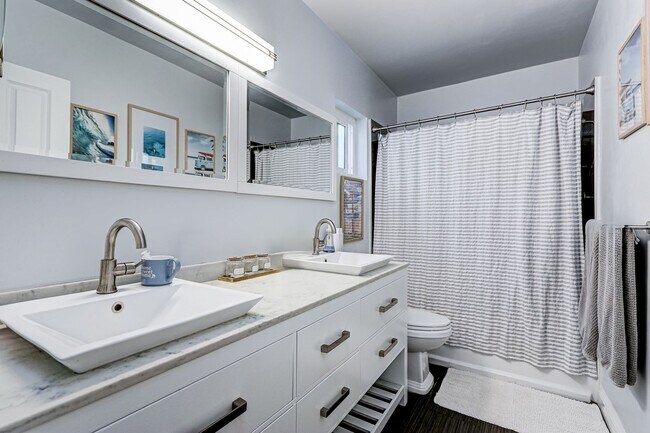 Building Photo - REMODELED, BRIGHT & AIRY HOME ON ONE OF TH...
