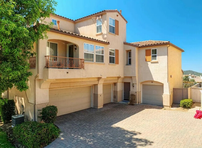 Townhome with 2 attached 1 car garages with ample storage and laundry hookups - 948 Bolex Way