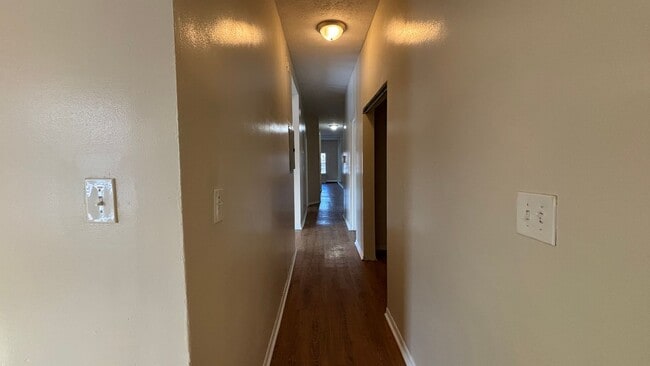 Building Photo - 4 Bedrooms 1.5 Bath Apartment with Heat and Hot Water Included!