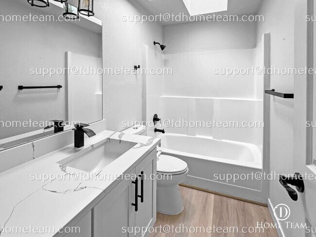 Building Photo - "Charming 3-Bedroom Retreat with Cozy Fire...