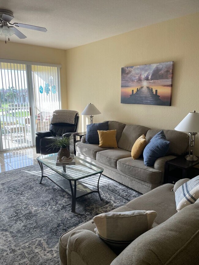 Building Photo - Furnished 3 Bedroom 2 Bath with Garage Pun...