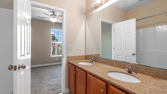 Building Photo - Located just Steps from Shopping, Dining, & Entertainment in The Market Common