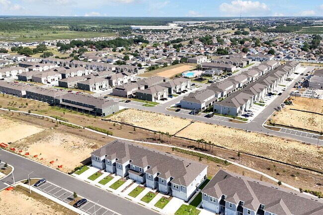 Building Photo - Beautiful New 3-Bedroom Townhome in Davenport — Includes Resort Pool, Modern Clubhouse & Family P...