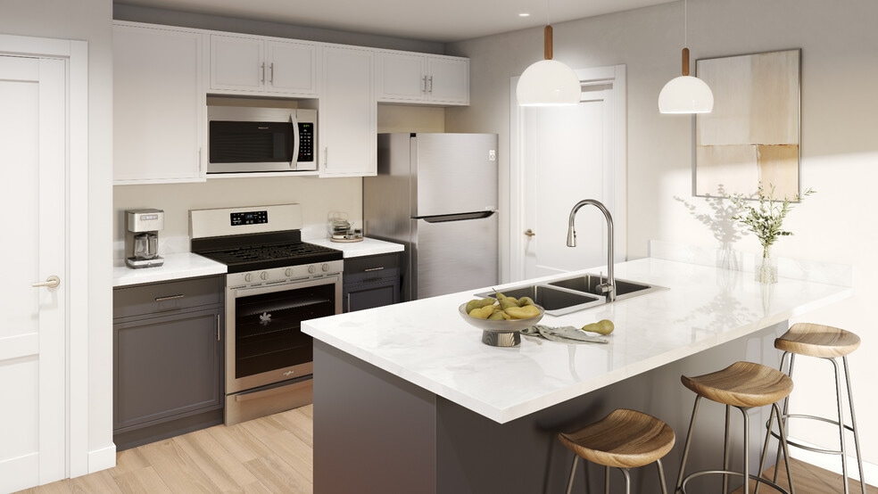 Madern kitchen with beautiful quartz counter island - Madison View Apartments
