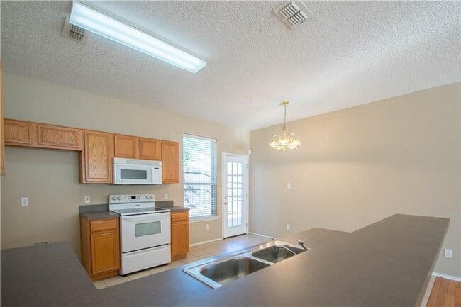 Building Photo - 6316 Downeast Dr