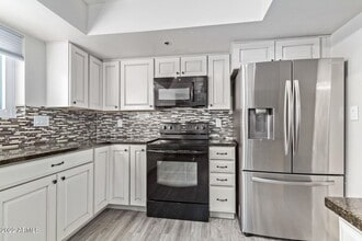 Building Photo - Charming 2 Bed 2 Bath Townhome near Downto...