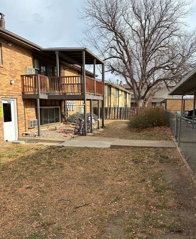 Building Photo - Spacious 2-Bedroom Apartment with Massive Private Deck, Covered Parking & Utilities Included!