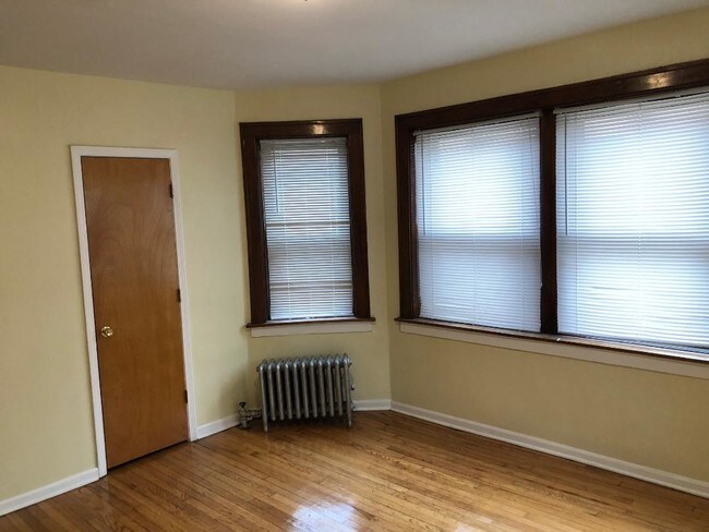 Building Photo - 7655-7657 S Coles Ave