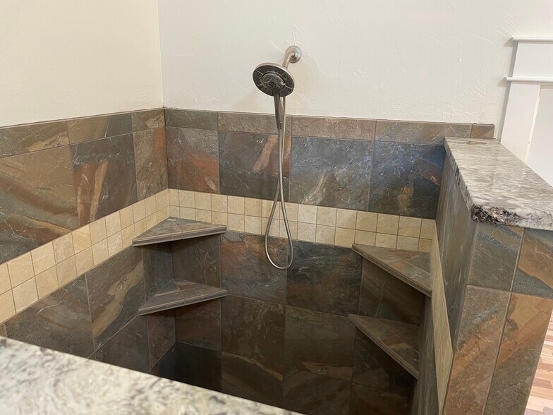 Walk-in Roman tutone tiled shower - 1184 Rutherford Dr