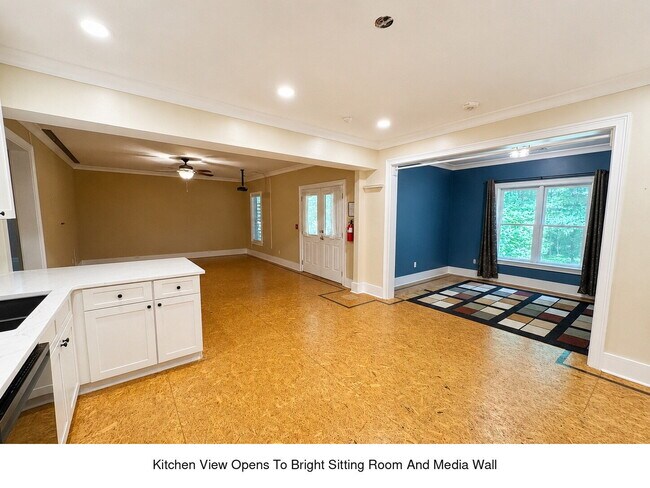 Building Photo - Three Levels. Two Kitchens. Seven Bedrooms. Endless Possibilities.