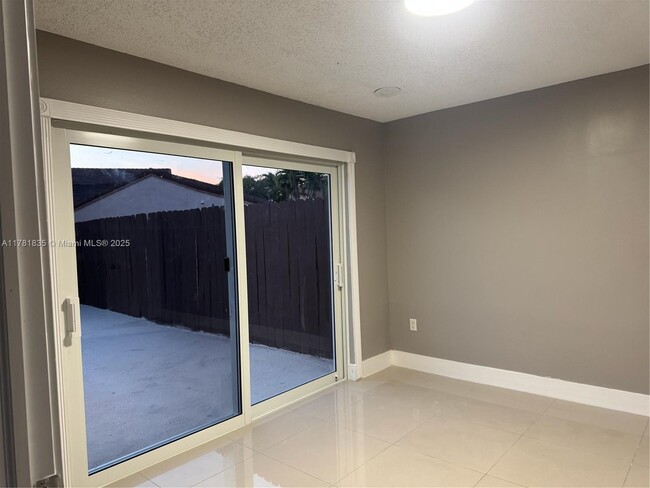 Building Photo - 1096 SW 134th Ct