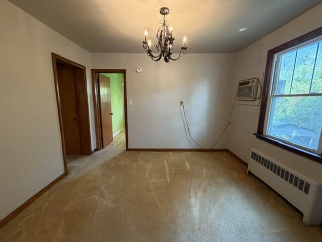 Building Photo - Three Levels of Living with 4 Bedrooms, 2 Full Bathrooms and Multiple Living Areas!