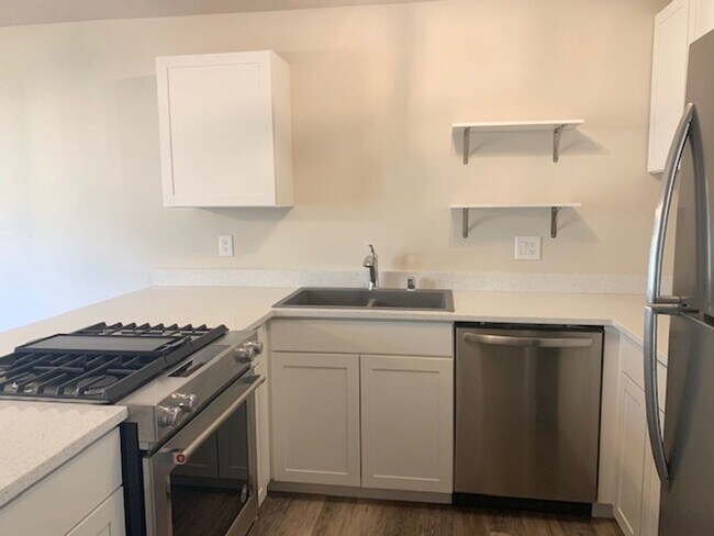 Primary Photo - Inviting 2BR Gem with Balcony Views in For...