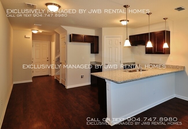 Building Photo - 8482 McGirts Village Ln