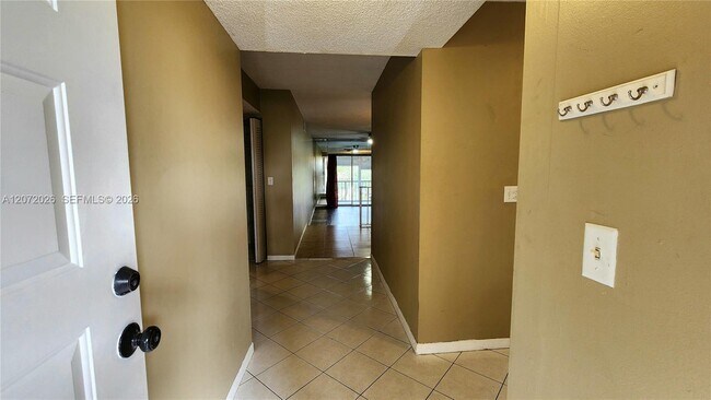 Building Photo - 2700 Coral Springs Dr