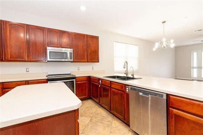 Building Photo - 9763 Moss Rose Way