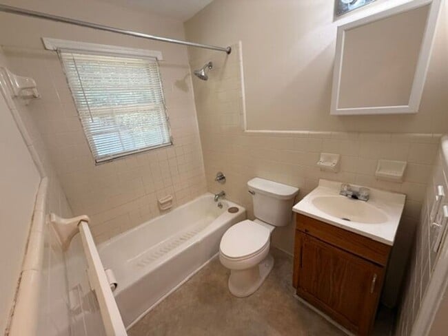 Building Photo - Three bedroom brick home available now!