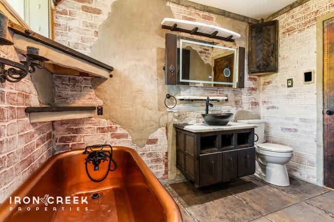 Building Photo - Beautifully Updated Three-Bedroom with Koi...
