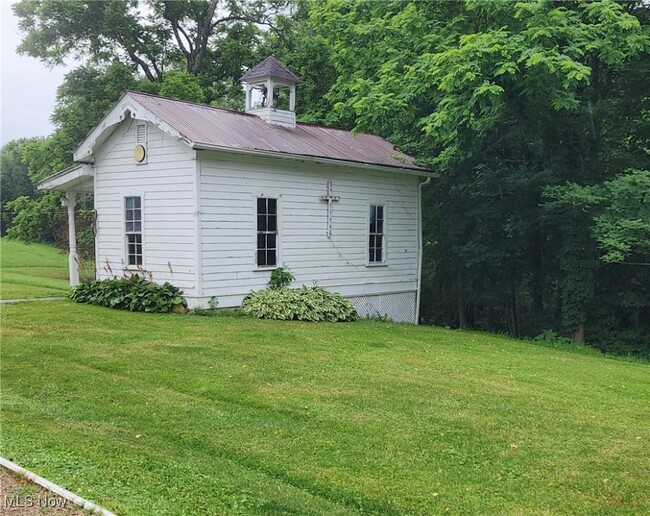 Building Photo - 9090 Radcliffe Rd