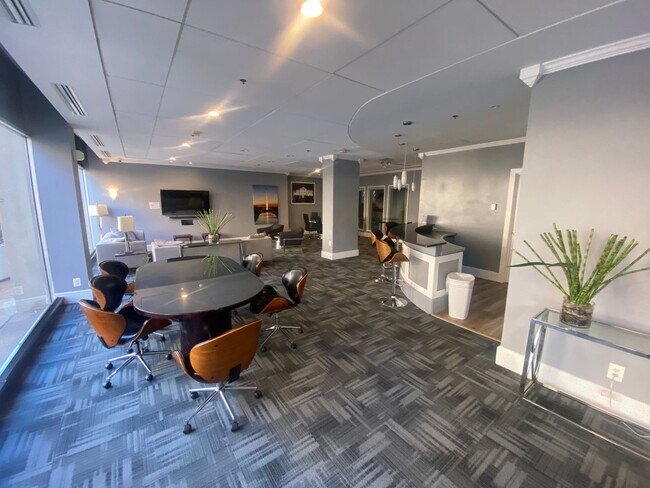 Building Photo - Bright and Sophisticated Studio Minutes Away from The Warf With Storage, Parking & Utilities Incl...