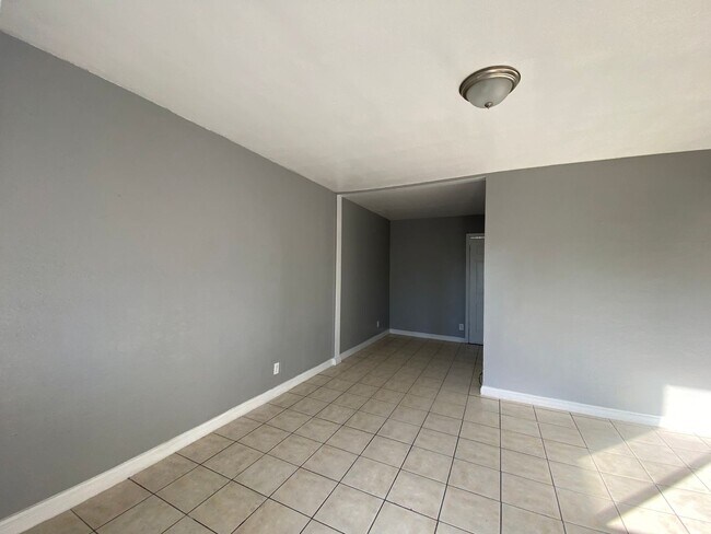 Building Photo - Hard to Find 1 BD 1 BA House with a 2 car garage and it's own yard.