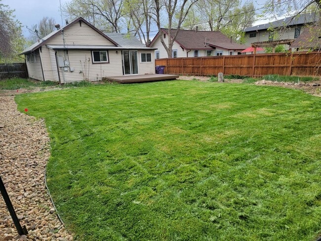 Building Photo - 4-bed, 2-bath home with large back yard