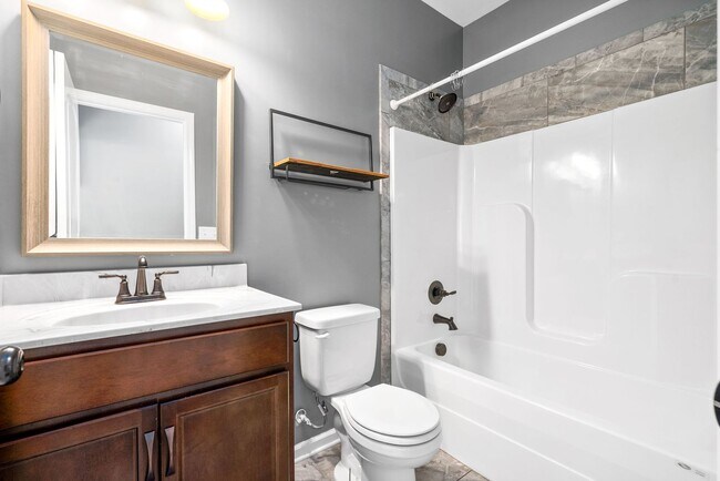 Building Photo - Pet Friendly Four Bedroom with Bonus!