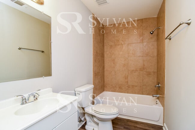 Building Photo - You'll love this charming brick home!