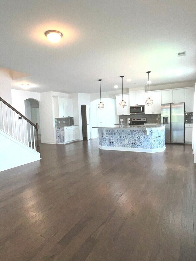 Building Photo - "Spacious 4-Bed Oasis with Stunning Lake V...