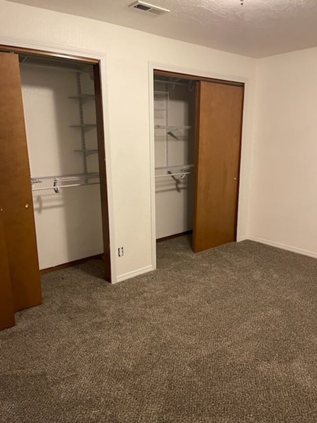 Building Photo - Waterfront! Sunset views! 3 bdrms! Attached garage! Private driveway!