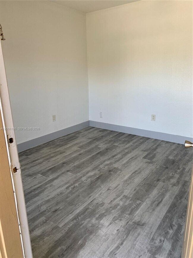 Building Photo - 241 S Royal Poinciana Blvd