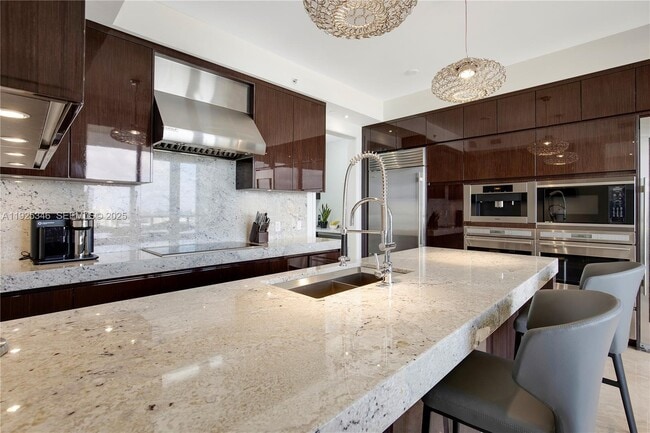 Building Photo - 9705 Collins Ave