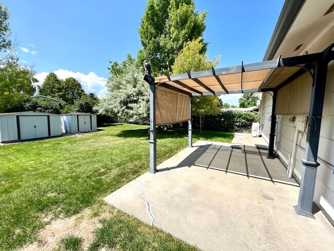 Building Photo - 4 bed 2 bath Single Family Home with Bonus Room, Fully Fenced Yard and Double Car Garage Close to...