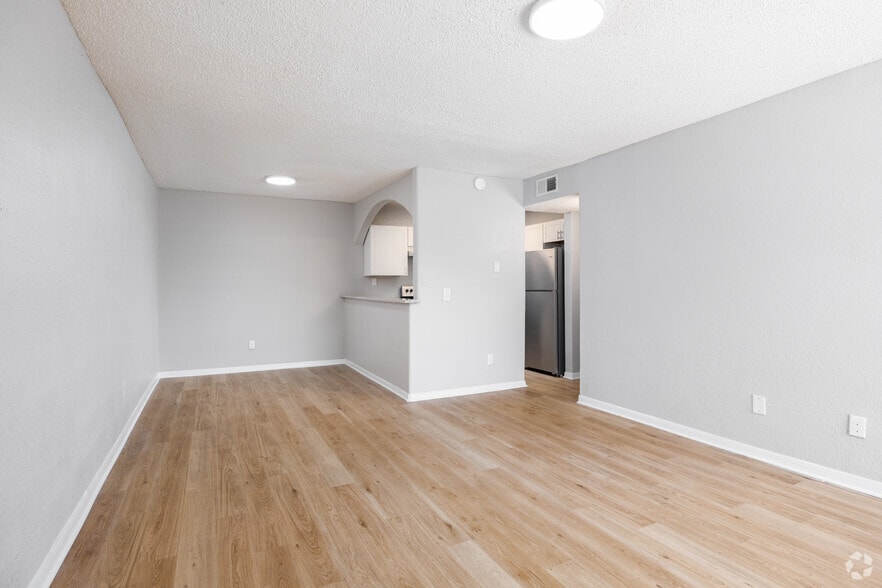 3BR, 2BA - 1,187SF - Living Room, Dining Room - Magnolia Court