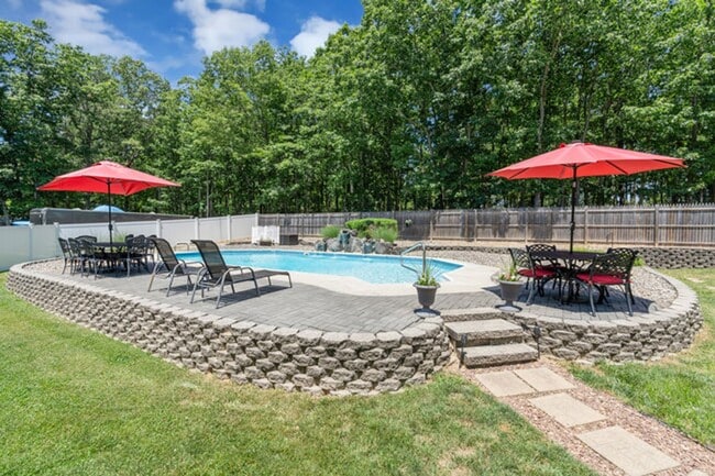 Building Photo - Private Cul-de-Sac Living: 4BR Home with Pool & Geothermal HVAC