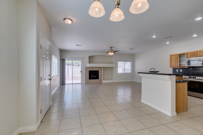 Building Photo - Great townhome in Henderson Gated Community with a 2 car attached garage and backyard