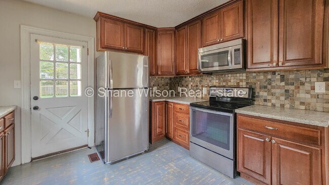 Building Photo - "Charming 4-Bed Chattanooga Home with Hard...