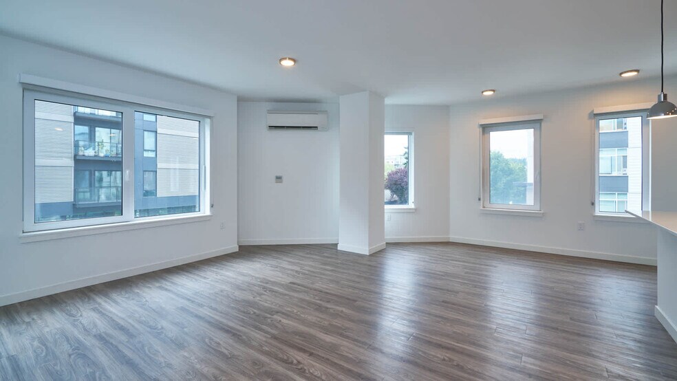 Living Room with Hard Surface Flooring - Zephyr on the Park