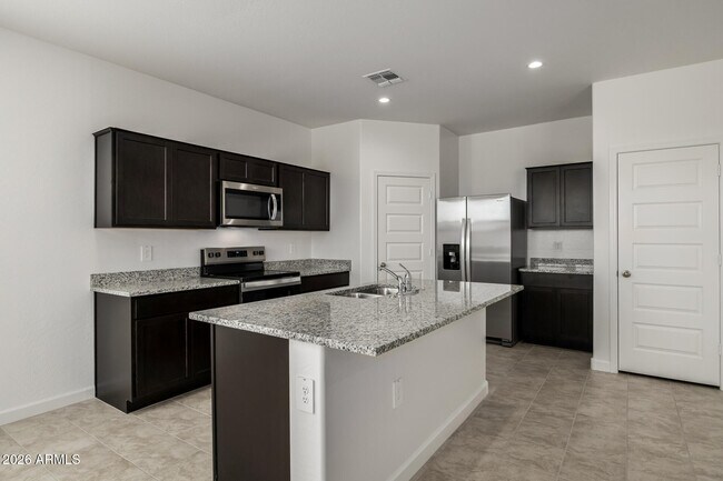 Building Photo - 9173 S Palo Verde Dr