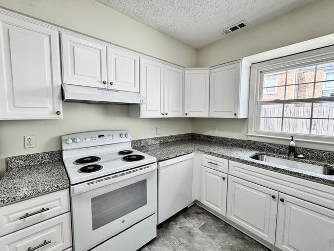 Building Photo - READY NOW!! Fenced Patio - Pet Friendly - Over 1,500 Square Feet!!