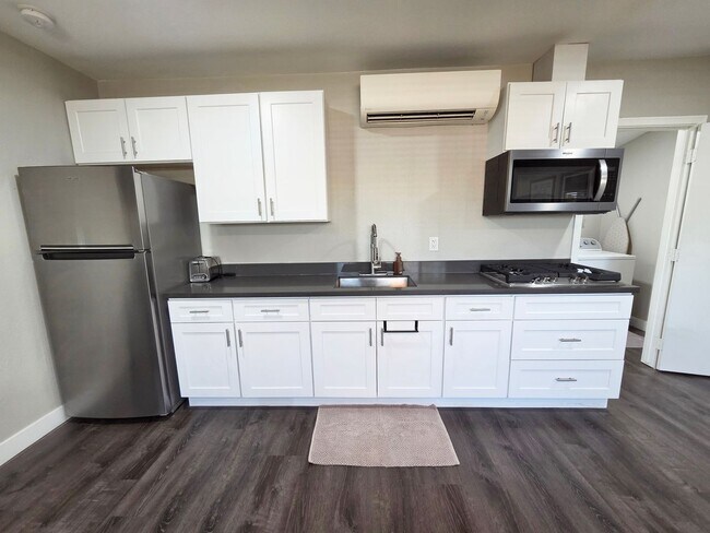Building Photo - Private Studio | Utilities & Wi-Fi Included