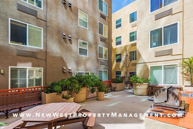 Building Photo - Charming Little Italy 1-Bedroom at Portico! Small Pet OK! Available Now!