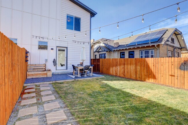 Building Photo - $4,145.95 - 3 Bed, 2.5 Bath Townhome In Denver with Central AC and Outdoor Space!
